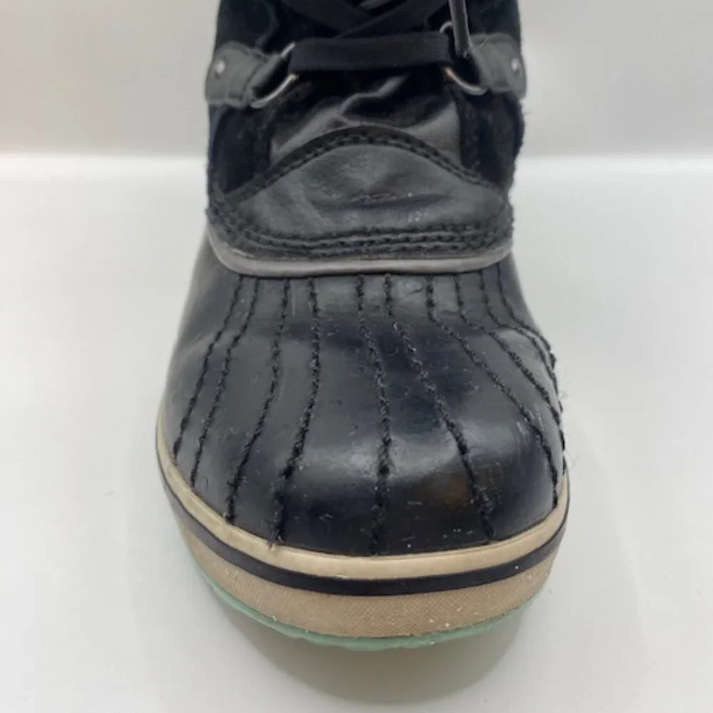 Kids SOREL black and blue lace up snow boots faux fur